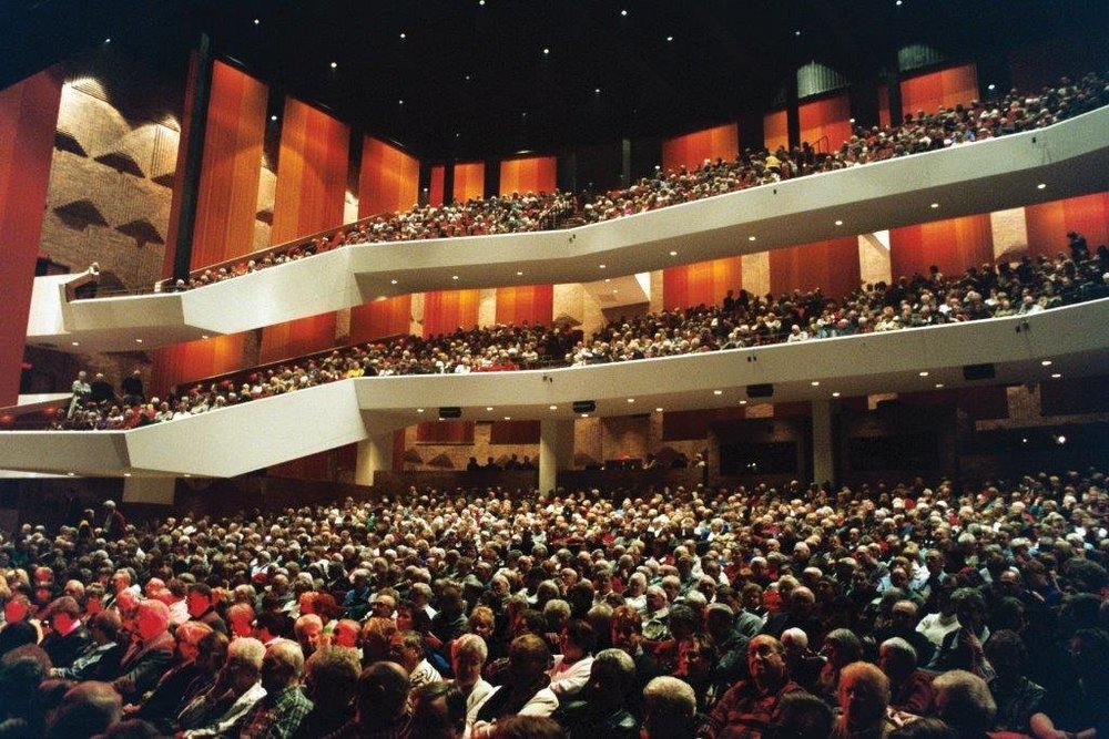 Full audience seated and looking towards stage at FirstOntario Concert Hall.