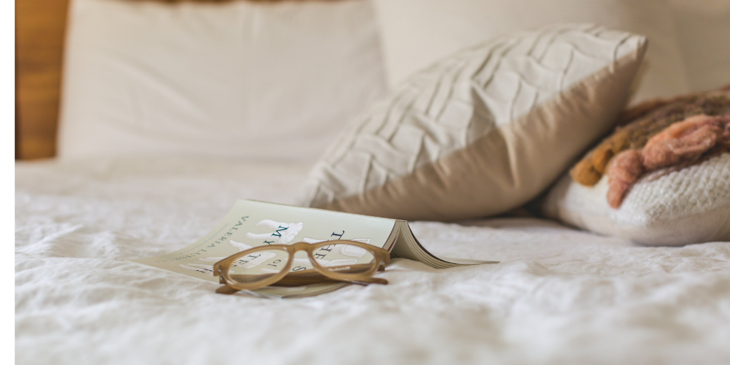 Glasses on bed