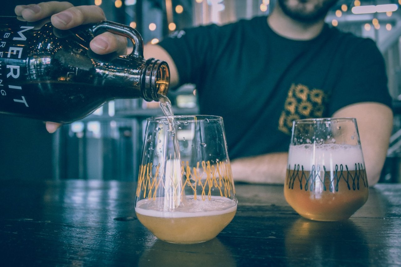 Man enjoying Merit beer