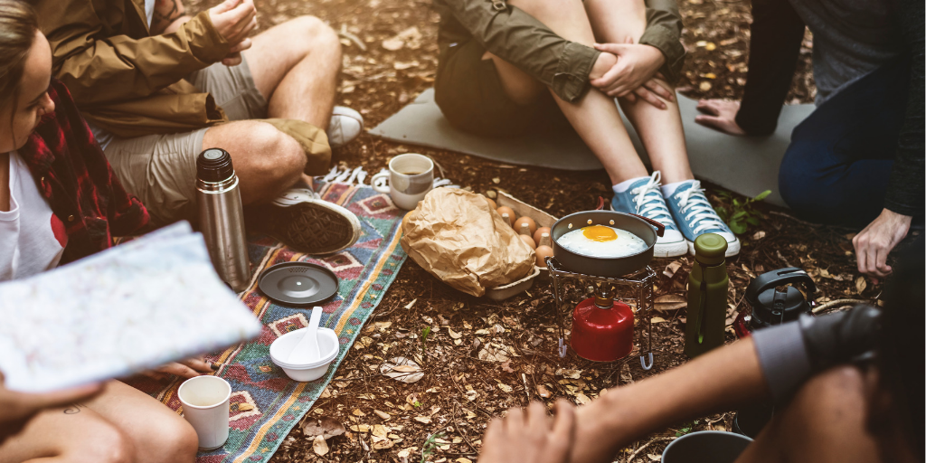 Campers making breakfast