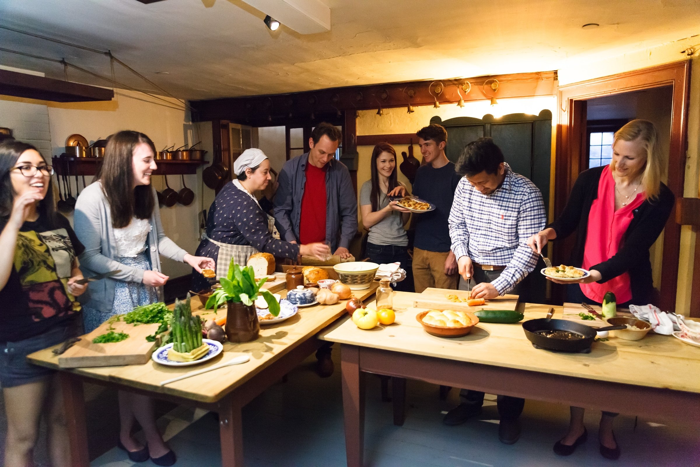 Adults in Historic Kitchen during a workshop.