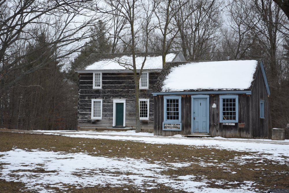 Snow covered historic house at Westfield Heritage Village.