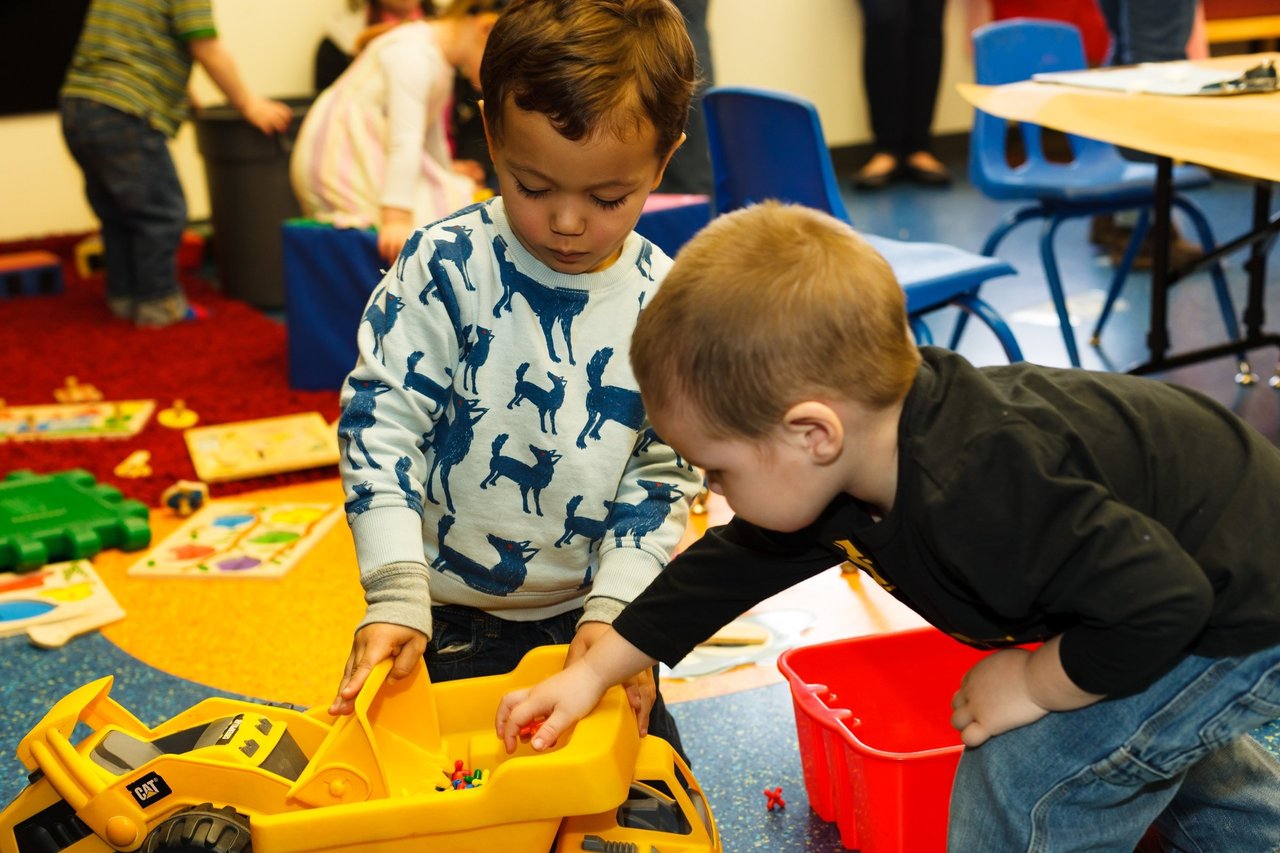 Children playing inside museum