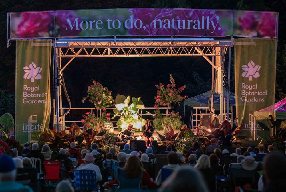 Stage lit up at night at Royal Botanical Gardens.