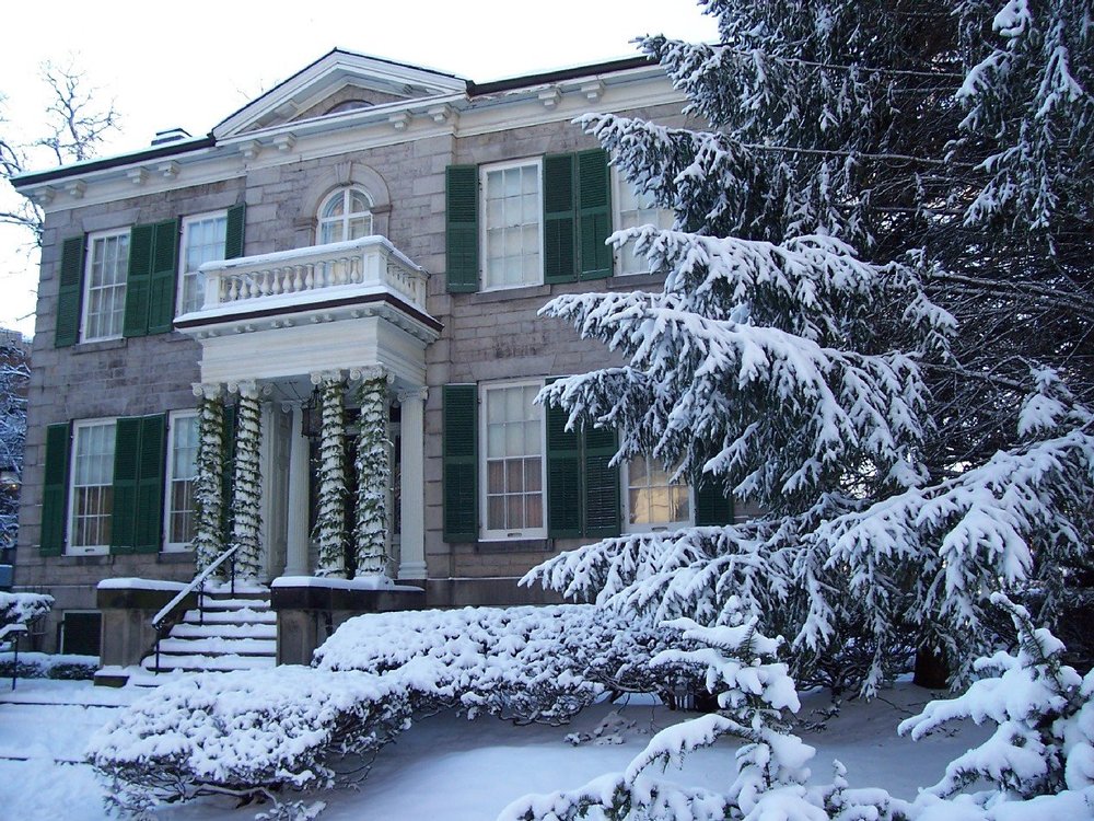 Snow covered exterior of the stately Whitehern Historic House.