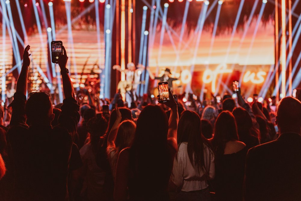 Full stage lights on during a concert performance.