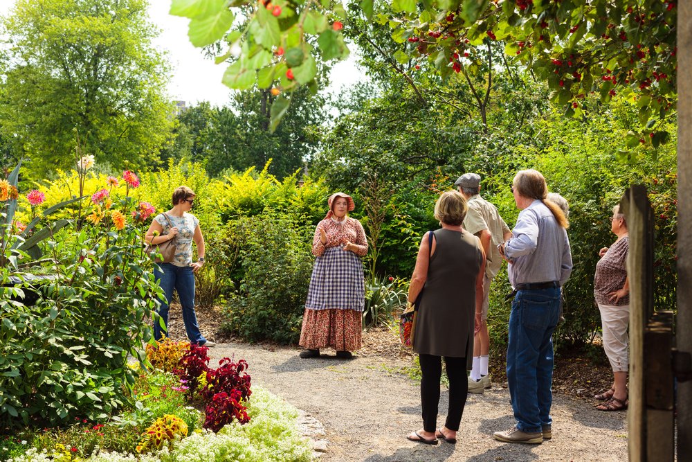 Group on a tour in the Dundurn historic Kitchen Garden.