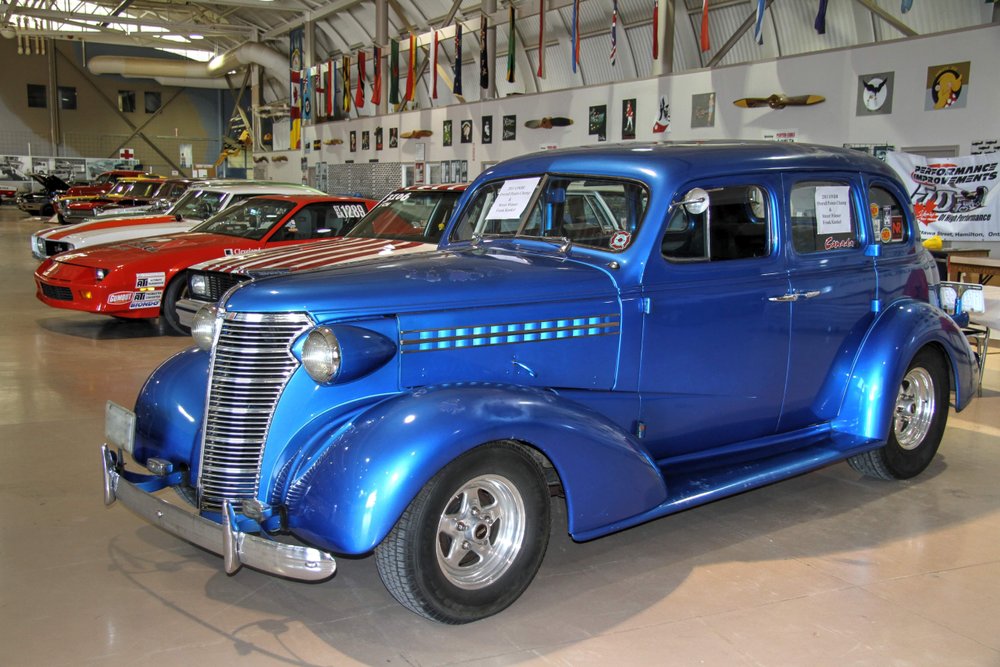 Vintage drag racing car inside the Canadian Warplane Heritage Museum.